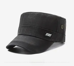 Detail view of black vintage washed denim flat top cap featuring SM5 embroidery