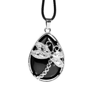 Black teardrop stone necklace with silver dragonfly filigree on black cord cord
