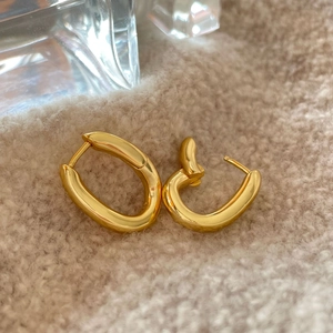 Minimalist 925 sterling silver curved gold hoop earrings with smooth mirror finish