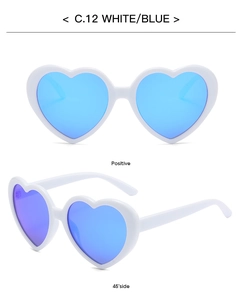 Front and 45-degree views of white heart sunglasses with blue mirrored lenses