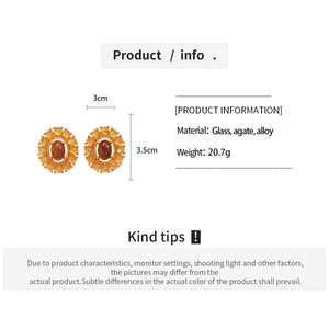 Detail view of oval agate glass earrings with 3cm width and 3.5cm height measurements