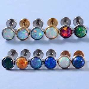 Set of 12 stainless steel opal labret studs with internal threading in various colors