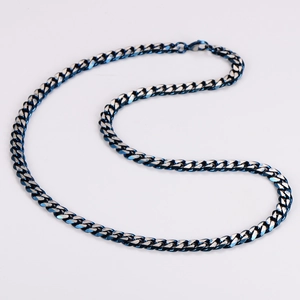 Close-up of minimalist Cuban chain necklace with cool silver to blue gradient finish