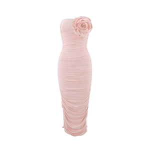 Detail of pink strapless bodycon dress with large 3D floral accent and ruched fabric