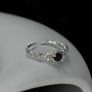 Adjustable S925 silver ring featuring a black zircon and unique lava rock texture