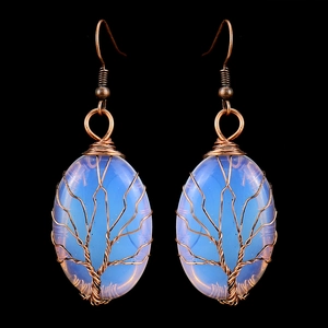 Detailed wire-wrapped tree of life earrings with opalite stones on copper wire
