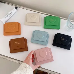 Short PU leather macaron wallet for women with heart pattern in seven vibrant colors