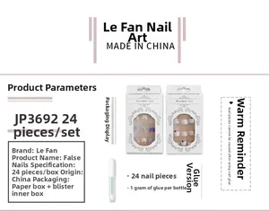 Detail view of JP3692 French black star heart press-on nail kit with 24 pieces and glue