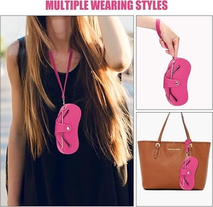 Rose red lychee leather glasses pouch with lanyard shown as a necklace and bag charm