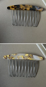 Detail of tortoiseshell and marble acetate hair combs with durable metal teeth
