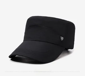Close-up of black quick-dry cadet cap featuring silver shield M logo and stitched brim