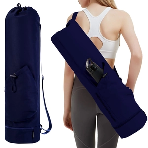 Yoga mat bag with water bottle pocket and adjustable strap in dark blue color detail.