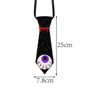 Detail of black glitter Halloween tie with eyeball pattern showing 25cm length dimension