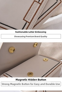 Detail of beige shoulder bag showing embossed lettering and gold magnetic closure snap