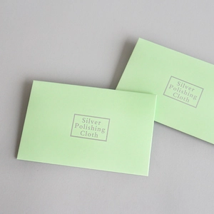 Premium light green silver polishing cloth in professional envelope packaging