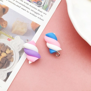 Detailed view of colorful resin marshmallow charms for DIY jewelry making and phone cases