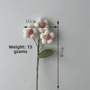 Detail of handmade crochet puff flower in pink and white with 46cm stem and 10cm width