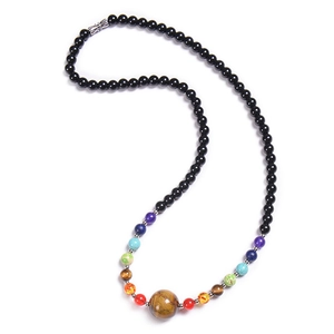 Detail view of 6mm chakra bead necklace with natural tiger eye stone and colorful gemstones