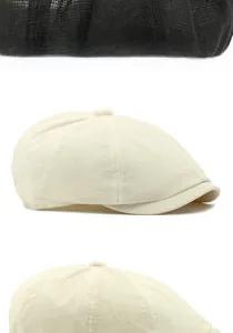 Detail of breathable mesh fabric on newsboy caps in black and cream white colors