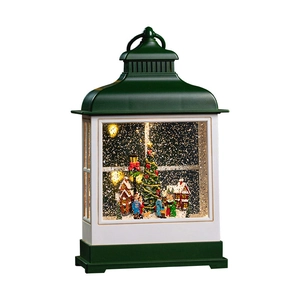 Vintage green Christmas lantern music box with snow globe scene and white roof accent