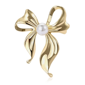 Elegant golden alloy bow brooch featuring a polished white pearl center for women