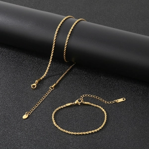 Detailed view of 18K gold plated stainless steel rope chain bracelet and necklace set