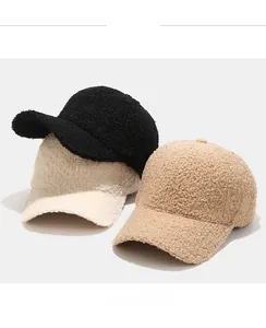 Three lamb wool baseball caps in black, cream, and camel colors for winter warmth