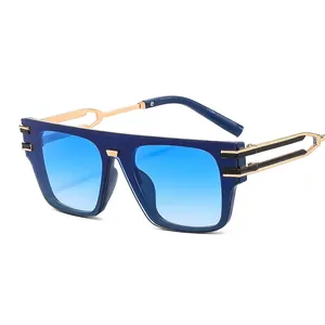 Modern oversized deep blue sunglasses with gradient lenses and gold hollow metal temples