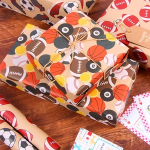 Vintage kraft wrapping paper featuring assorted sports balls like soccer and basketball