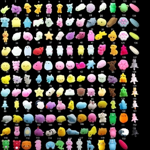 Variety of colorful TPR animal squishy toys neatly arranged in numbered grid on black background