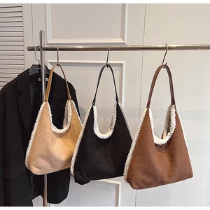 Autumn suede shoulder bags with sherpa trim in brown black and khaki colors