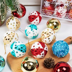 Christmas foam glitter ornament set with pine cones and branches in a wooden tray
