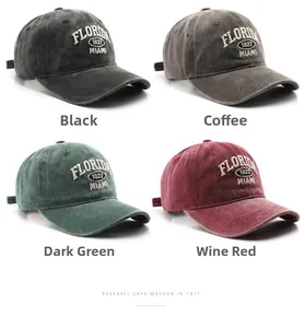 Detail of vintage washed baseball caps in black, coffee, dark green and burgundy colors
