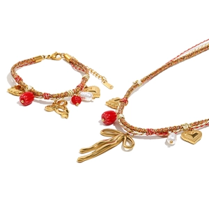 18K gold plated butterfly pendant necklace and woven cotton tassel bracelet set