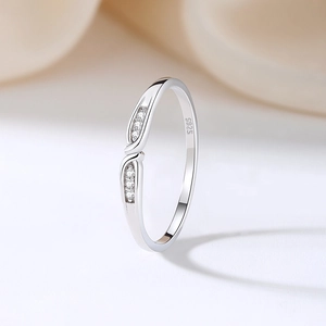 Minimalist S925 sterling silver stacking ring with shimmering micro-pave cubic zirconia stones