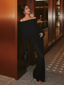 Elegant black off-shoulder long sleeve knitted maxi dress with a slim-fit silhouette
