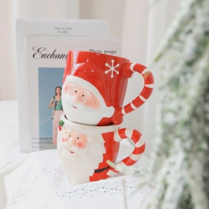 3D Santa Claus ceramic mug with hand-painted details and striped handle for Christmas