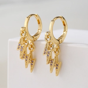 Fashionable 18K gold plated lightning bolt drop earrings with purple zircon stones