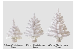 Three sizes of white mini Christmas trees with fabric bases in 30cm, 45cm, and 60cm heights