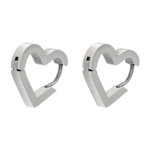 Macro view of heart-shaped stainless steel huggie earrings with a matte brushed finish