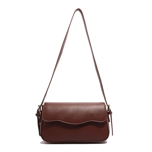 Retro brown leather shoulder bag for women with minimalist rectangular flap and sleek strap