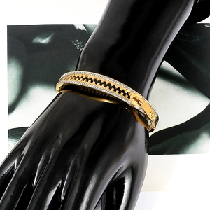 Creative gold-plated zipper shaped stainless steel bangle with sparkling pave zircon accents