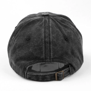 Washed black baseball cap with embroidered letters and adjustable metal buckle back