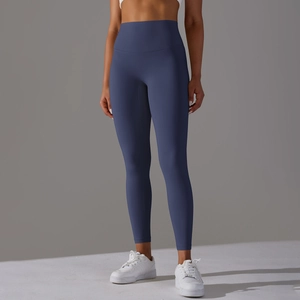 Close-up of wide waistband on high-rise yoga pants for tummy control and support