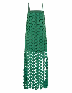 Detailed view of green french style dress featuring hollow out circular dot patterns