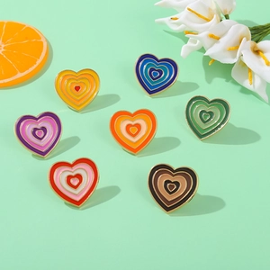 Set of seven colorful gradient heart enamel brooches in Y2K style with alloy metal edges