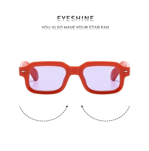 Front view of orange rectangular sunglasses featuring light purple tinted lenses and silver studs