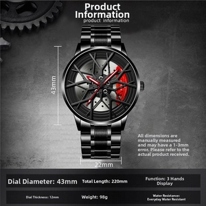 Detailed view of car wheel rim watch face with 43mm black steel case and red brake caliper