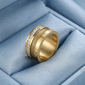 Golden Roman numeral ring with braided wire layers and sparkling inlaid zircons