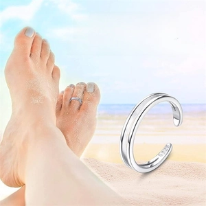S925 sterling silver open toe ring set for women worn on beach with summer vibes